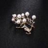 Rhinestone-encrusted Pearl Brooch
