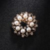 Rhinestone-encrusted Pearl Brooch