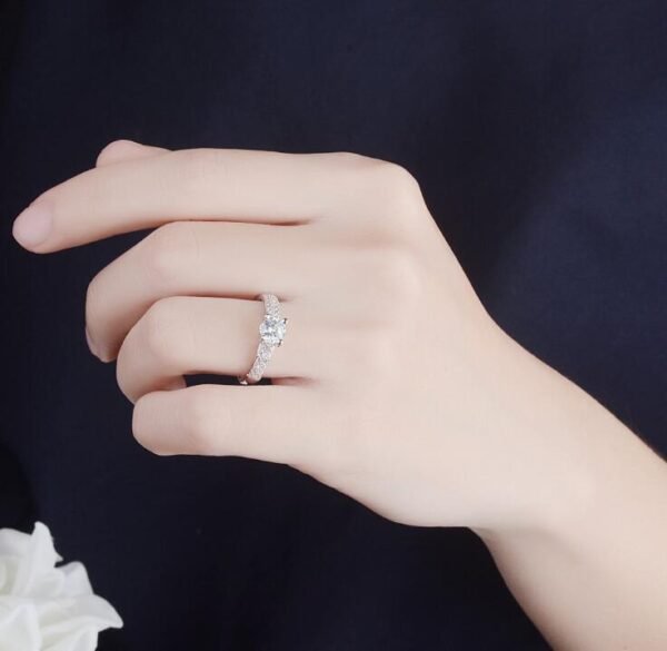 1064704691400.jpg Handmade female zircon ring