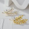 1730792676674113536.jpg High-grade Leaf Pearl Brooch For Women