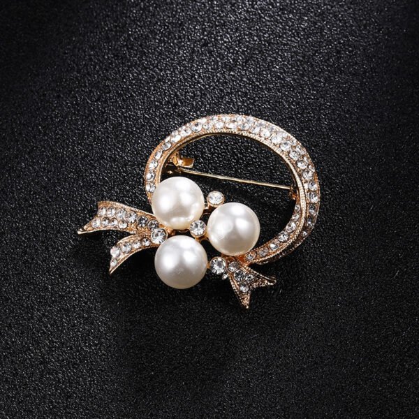 Rhinestone-encrusted Pearl Brooch