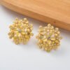 721629ff-7860-4288-974f-338235b5363d.jpg Floral Jewelry Adorned With Diamonds