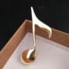 8799b95d-7d8b-4ef5-92f7-ca988591d48d.jpg Musical Note Natural Pin Brooch