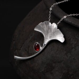 986520605274.jpg S925 silver leaf inlaid garnet pendant