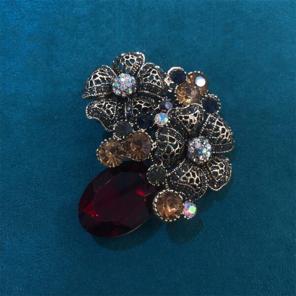 d6a9bd82-6666-4879-9fca-619e2f9c81c5.jpg Crystal Glass French Flower Jacket Pin