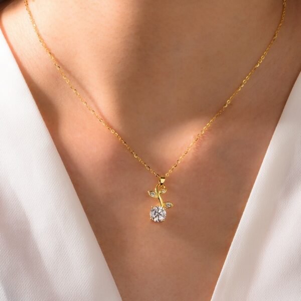 76f86015-ad27-47ce-befd-ed6feb874f24.jpeg Silver Gold Plated Leaf Necklace